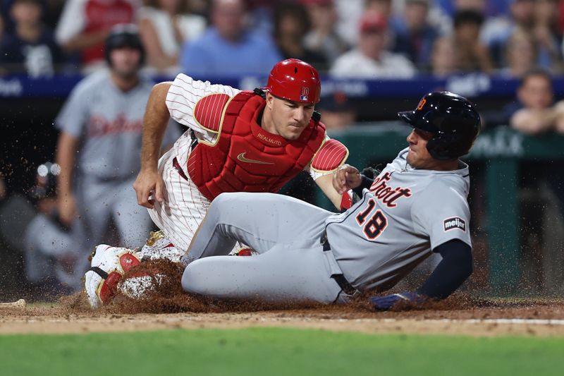 Aug 3, 2025; Philadelphia, Pennsylvania, USA; Philadelphia Phillies catcher J.T. Realmuto (10) tags out Detroit Tigers outfielder Jahmai Jones (18) at home plate during the seventh inning at Citizens Bank Park. Mandatory Credit: Bill Streicher-Imagn Images