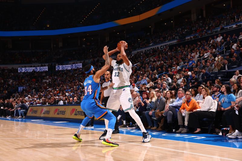 OKLAHOMA CITY, OK - JANUARY 29: Karl-Anthony Towns #32 of the Minnesota Timberwolves handles the ball during the game against the Oklahoma City Thunder on January 29, 2024 at Paycom Arena in Oklahoma City, Oklahoma. NOTE TO USER: User expressly acknowledges and agrees that, by downloading and or using this photograph, User is consenting to the terms and conditions of the Getty Images License Agreement. Mandatory Copyright Notice: Copyright 2024 NBAE (Photo by Zach Beeker/NBAE via Getty Images)