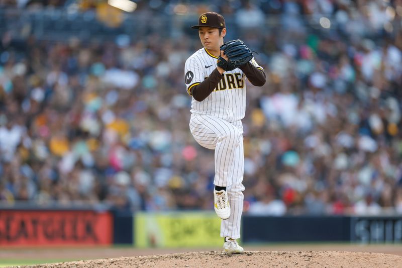 May 27, 2024; San Diego, California, USA; San Diego Padres relief pitcher Yuki Matsui (1) throws a pitch in the eighth inning against against the Miami Marlins at Petco Park. Mandatory Credit: David Frerker-USA TODAY Sports