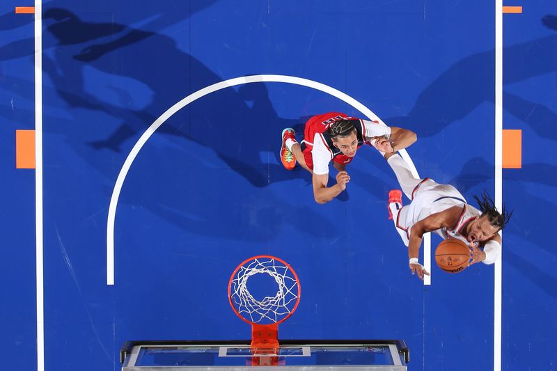 NEW YORK, NY - OCTOBER 9: Jalen Brunson #11 of the New York Knicks drives to the basket during the game against the Washington Wizards during the 2024 NBA Preseason on October 9, 2024 at Madison Square Garden in New York City, New York.  NOTE TO USER: User expressly acknowledges and agrees that, by downloading and or using this photograph, User is consenting to the terms and conditions of the Getty Images License Agreement. Mandatory Copyright Notice: Copyright 2024 NBAE  (Photo by Nathaniel S. Butler/NBAE via Getty Images)