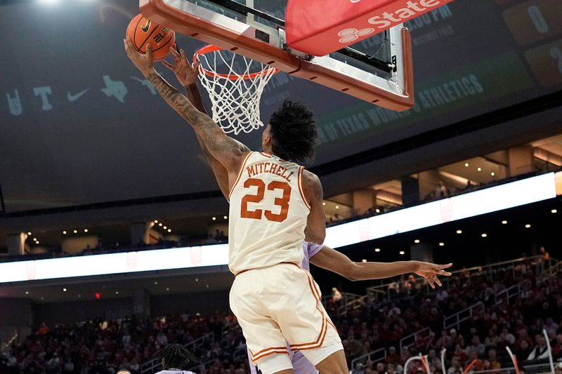 Feb 19, 2024; Austin, Texas, USA; Texas Longhorns forward Dillon Mitchell (23) lays in a basket during the first half against the Kansas State Wildcats at Moody Center. Mandatory Credit: Scott Wachter-USA TODAY Sports