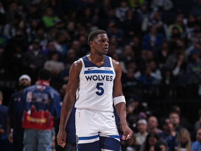 MINNEAPOLIS, MN -  MARCH 27:  Anthony Edwards #5 of the Minnesota Timberwolves looks on during the game against the Detroit Pistons on March 27, 2024 at Target Center in Minneapolis, Minnesota. NOTE TO USER: User expressly acknowledges and agrees that, by downloading and or using this Photograph, user is consenting to the terms and conditions of the Getty Images License Agreement. Mandatory Copyright Notice: Copyright 2024 NBAE (Photo by Jordan Johnson/NBAE via Getty Images)