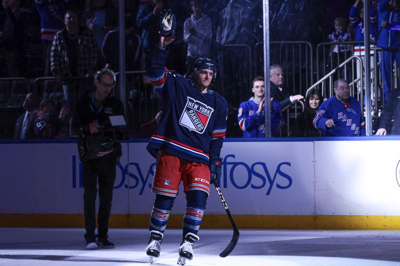 Mar 17, 2024; New York, New York, USA; New York Rangers center Jonny Brodzinski (22) waves to fans after the game against the New York Islanders at Madison Square Garden. Mandatory Credit: Vincent Carchietta-USA TODAY Sports