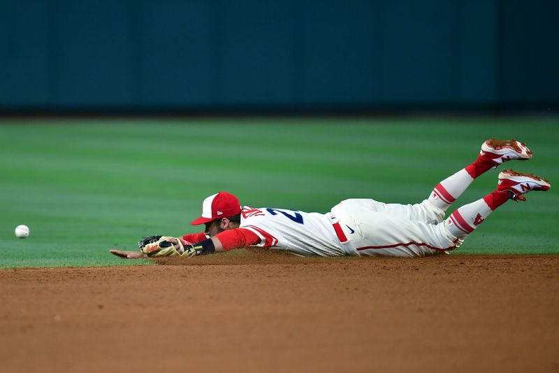 Jul 1, 2023; Anaheim, California, USA; Los Angeles Angels shortstop David Fletcher (22) misses fielding the RBI single of Arizona Diamondbacks center fielder Dominic Fletcher (8) during the sixth inning at Angel Stadium. Mandatory Credit: Gary A. Vasquez-USA TODAY Sports