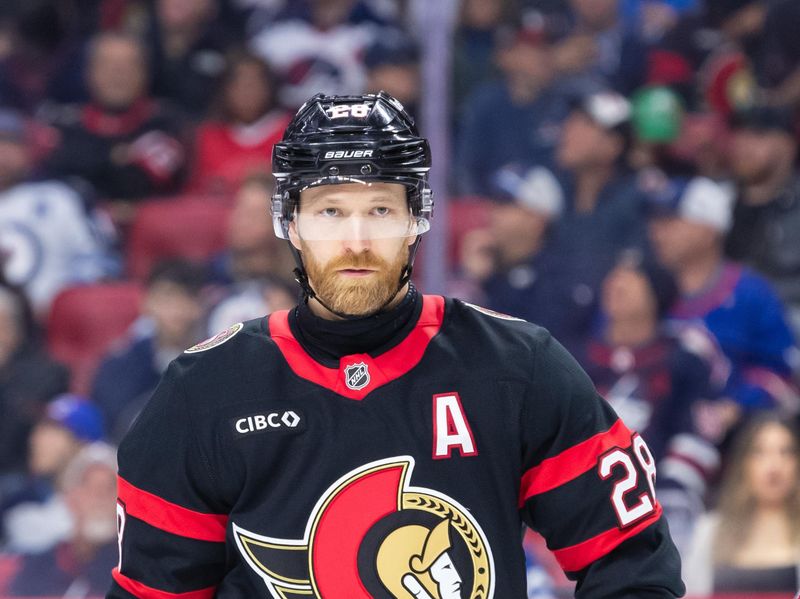 Feb 26, 2025; Ottawa, Ontario, CAN; Ottawa Senators right wing Claude Giroux (28) skates in the first period against the Winnipeg Jets at the Canadian Tire Centre. Mandatory Credit: Marc DesRosiers-Imagn Images