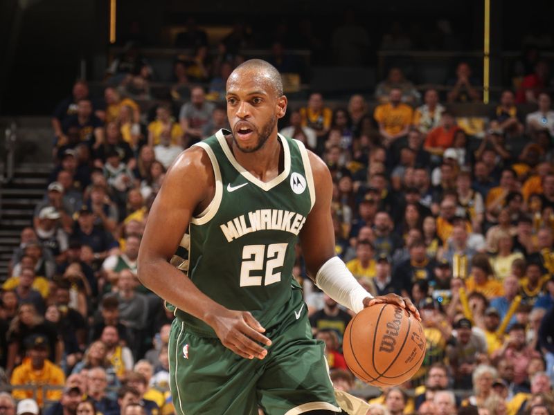 INDIANAPOLIS, IN - APRIL 28: Khris Middleton #22 of the Milwaukee Bucks dribbles the ball during the game against the Indiana Pacers during Round 1 Game 4 of the 2024 NBA Playoffs on April 28, 2024 at Gainbridge Fieldhouse in Indianapolis, Indiana. NOTE TO USER: User expressly acknowledges and agrees that, by downloading and or using this Photograph, user is consenting to the terms and conditions of the Getty Images License Agreement. Mandatory Copyright Notice: Copyright 2024 NBAE (Photo by Nathaniel S. Butler/NBAE via Getty Images)