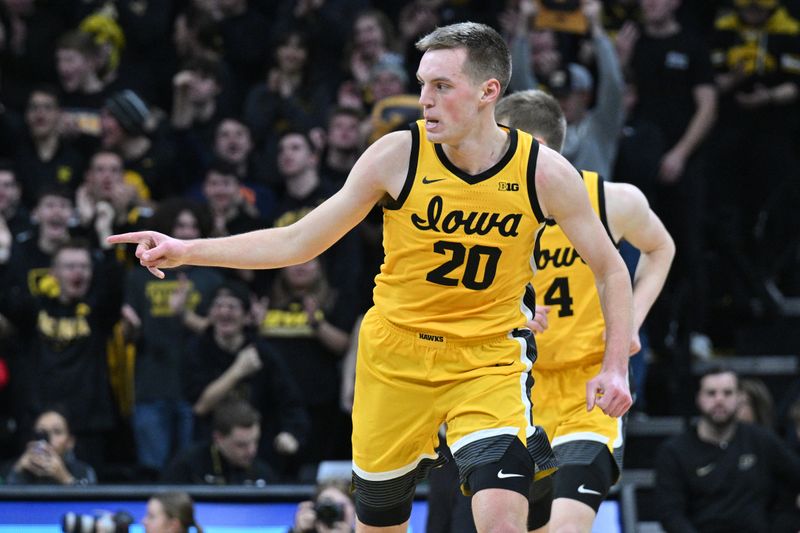 Jan 20, 2024; Iowa City, Iowa, USA; Iowa Hawkeyes forward Payton Sandfort (20) reacts during the first half against the Purdue Boilermakers at Carver-Hawkeye Arena. Mandatory Credit: Jeffrey Becker-USA TODAY Sports