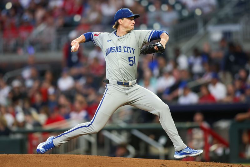 Sep 27, 2024; Atlanta, Georgia, USA; Kansas City Royals starting pitcher Brady Singer (51) throws against the Atlanta Braves in the first inning at Truist Park. Mandatory Credit: Brett Davis-Imagn Images