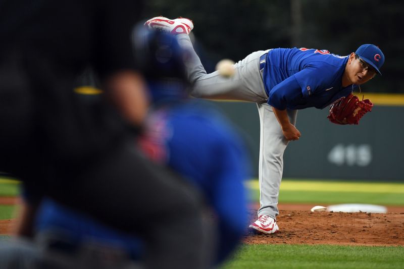 Aug 30, 2025; Denver, Colorado, USA; Chicago Cubs pitcher Javier Assad (72) pitches during the first inning against the Colorado Rockies at Coors Field. Mandatory Credit: Christopher Hanewinckel-Imagn Images