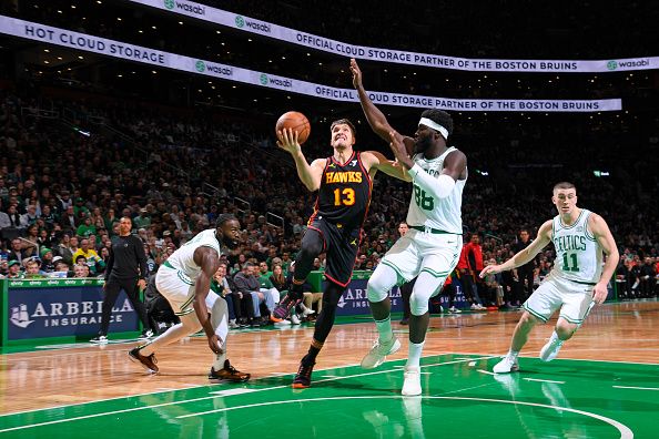 BOSTON, MA - November 26: Bogdan Bogdanovic #13 of the Atlanta Hawks drives to the basket during the game against the Boston Celtics on November 26, 2023 at the TD Garden in Boston, Massachusetts. NOTE TO USER: User expressly acknowledges and agrees that, by downloading and or using this photograph, User is consenting to the terms and conditions of the Getty Images License Agreement. Mandatory Copyright Notice: Copyright 2023 NBAE  (Photo by Brian Babineau/NBAE via Getty Images)