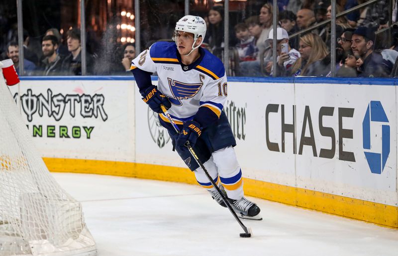 Mar 9, 2024; New York, New York, USA; St. Louis Blues center Brayden Schenn (10) skates with the puck against the New York Rangers during the second period at Madison Square Garden. Mandatory Credit: Danny Wild-USA TODAY Sports