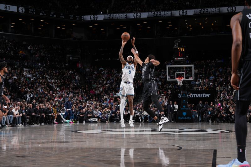 BROOKLYN, NY - JANUARY 25: Nickeil Alexander-Walker #9 of the Minnesota Timberwolves shoots a three point basket against the Brooklyn Nets on January 25, 2024 at Barclays Center in Brooklyn, New York. NOTE TO USER: User expressly acknowledges and agrees that, by downloading and or using this Photograph, user is consenting to the terms and conditions of the Getty Images License Agreement. Mandatory Copyright Notice: Copyright 2024 NBAE (Photo by Jesse D. Garrabrant/NBAE via Getty Images)