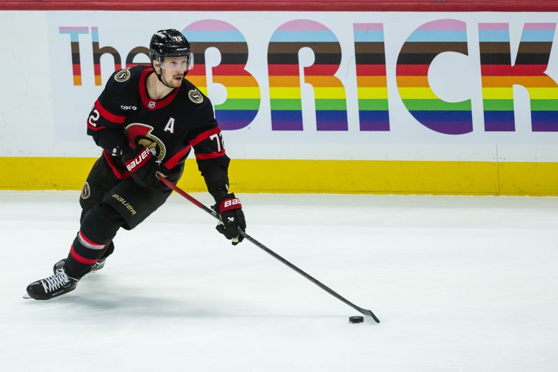 Apr 3, 2025; Ottawa, Ontario, CAN; Ottawa Senators defenseman Thomas Chabot (72) skates with the puck in the third period against the Tampa Bay Lightning at the Canadian Tire Centre. Mandatory Credit: Marc DesRosiers-Imagn Images
