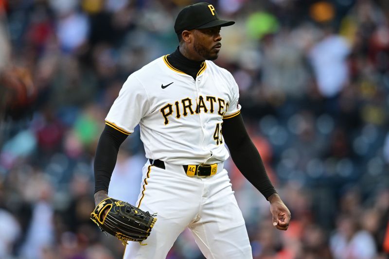 Apr 6, 2024; Pittsburgh, Pennsylvania, USA; Pittsburgh Pirates relief pitcher Aroldis Chapman (45) reacts after a strike out during the eighth inning against the Baltimore Orioles at PNC Park. Mandatory Credit: David Dermer-USA TODAY Sports