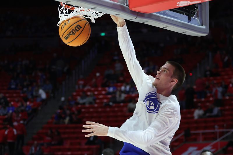 Dec 9, 2023; Salt Lake City, Utah, USA; Brigham Young Cougars forward Noah Waterman (0) warms up before a game against the Utah Utes at Jon M. Huntsman Center. Mandatory Credit: Rob Gray-USA TODAY Sports