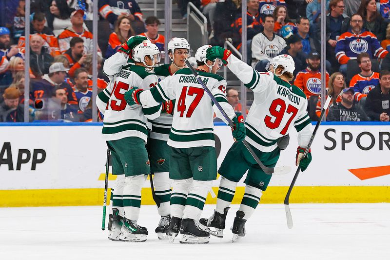 Feb 23, 2024; Edmonton, Alberta, CAN; The Minnesota Wild celebrate a goal scored by defensemen Jonas Brodin (25) during the third period against the Edmonton Oilers at Rogers Place. Mandatory Credit: Perry Nelson-USA TODAY Sports