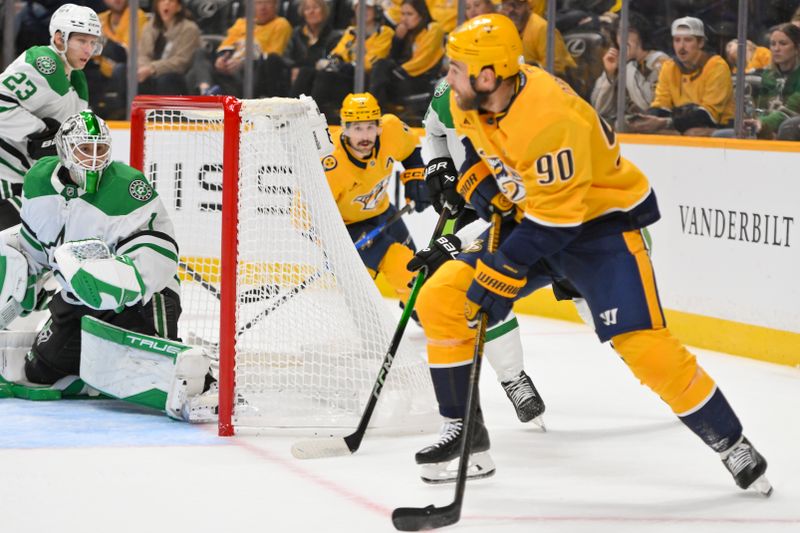 Oct 26, 2025; Nashville, Tennessee, USA;  Nashville Predators center Ryan O'Reilly (90) skates behind the net against the Dallas Stars during the first period at Bridgestone Arena. Mandatory Credit: Steve Roberts-Imagn Images