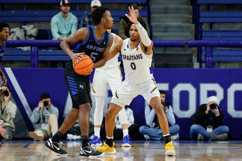 Jan 13, 2024; Colorado Springs, Colorado, USA; Air Force Falcons guard Ethan Taylor (5) controls the ball as San Jose State Spartans guard Myron Amey Jr. (0) guards in the first half at Clune Arena. Mandatory Credit: Isaiah J. Downing-USA TODAY Sports