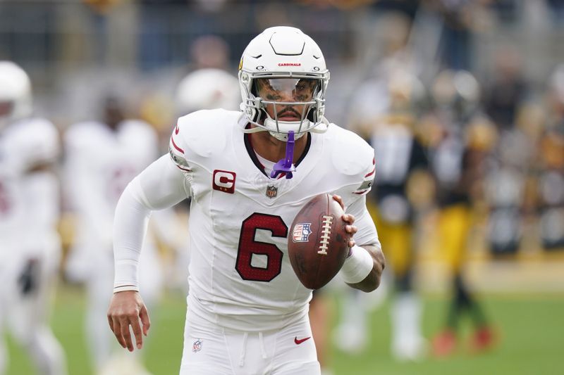 Arizona Cardinals running back James Conner warms up prior to an NFL football game against the Pittsburgh Steelers Sunday, Dec. 3, 2023, in Pittsburgh. (AP Photo/Matt Freed)