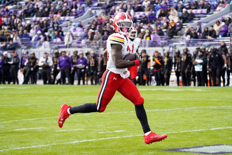 Oct 28, 2023; Evanston, Illinois, USA; Maryland Terrapins running back Roman Hemby (24) runs for a touchdown against the Northwestern Wildcats during the first half at Ryan Field. Mandatory Credit: David Banks-USA TODAY Sports