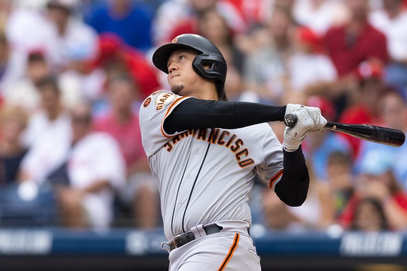 Aug 23, 2023; Philadelphia, Pennsylvania, USA; San Francisco Giants first baseman Wilmer Flores (41) hits a home run during the first inning against the Philadelphia Phillies at Citizens Bank Park. Mandatory Credit: Bill Streicher-USA TODAY Sports