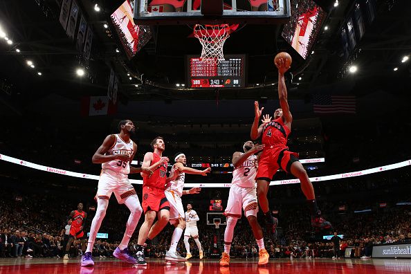 TORONTO, CANADA - NOVEMBER 29: Scottie Barnes #4 of the Toronto Raptors drives to the basket during the game against the Phoenix Suns on November 29, 2023 at the Scotiabank Arena in Toronto, Ontario, Canada.  NOTE TO USER: User expressly acknowledges and agrees that, by downloading and or using this Photograph, user is consenting to the terms and conditions of the Getty Images License Agreement.  Mandatory Copyright Notice: Copyright 2023 NBAE (Photo by Vaughn Ridley/NBAE via Getty Images)