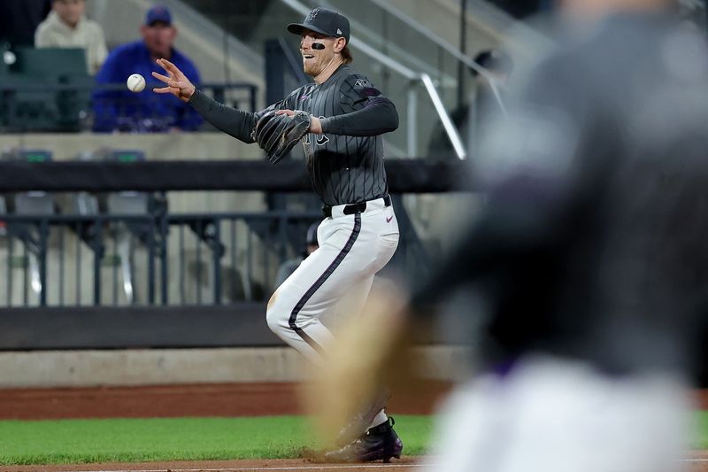 May 1, 2024; New York City, New York, USA; New York Mets third baseman Brett Baty (22) fields an infield single by Chicago Cubs left fielder Ian Happ (not pictured) during the sixth inning at Citi Field. Mandatory Credit: Brad Penner-USA TODAY Sports