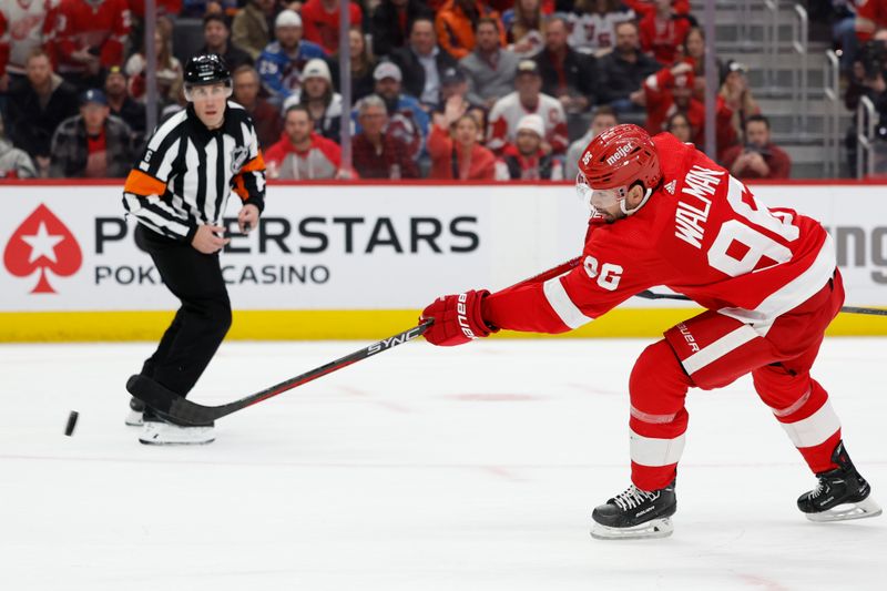 Feb 22, 2024; Detroit, Michigan, USA;  Detroit Red Wings defenseman Jake Walman (96) takes a shot in the second period against the Colorado Avalanche at Little Caesars Arena. Mandatory Credit: Rick Osentoski-USA TODAY Sports