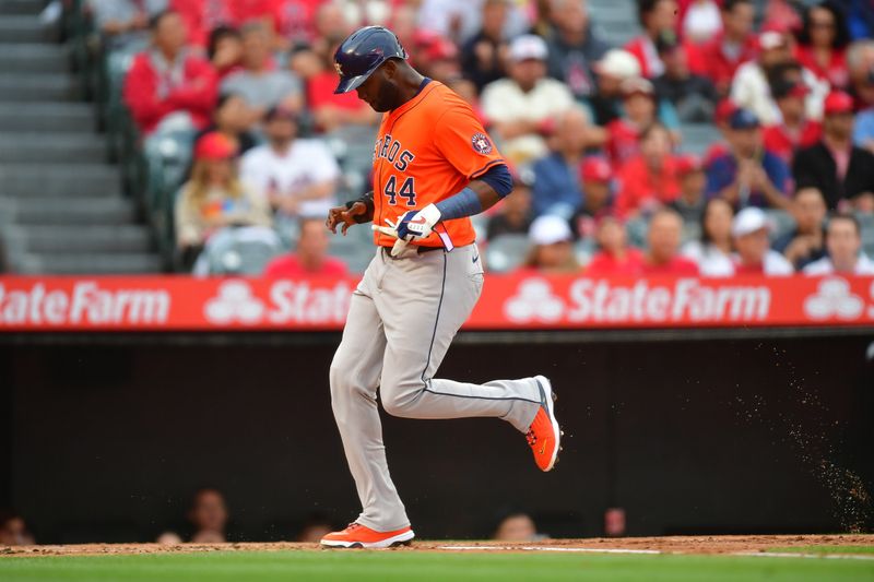 Jun 7, 2024; Anaheim, California, USA; Houston Astros outfielder Yordan Alvarez (44) scores a run against the Los Angeles Angels during the first inning at Angel Stadium. Mandatory Credit: Gary A. Vasquez-USA TODAY Sports