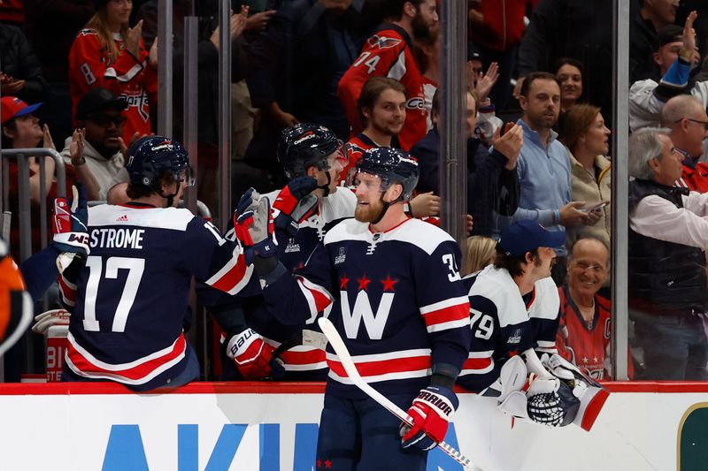 Nov 8, 2023; Washington, District of Columbia, USA; Washington Capitals right wing Anthony Mantha (39) celebrates with teammates after scoring a goal against the Florida Panthers in the second period at Capital One Arena. Mandatory Credit: Geoff Burke-USA TODAY Sports