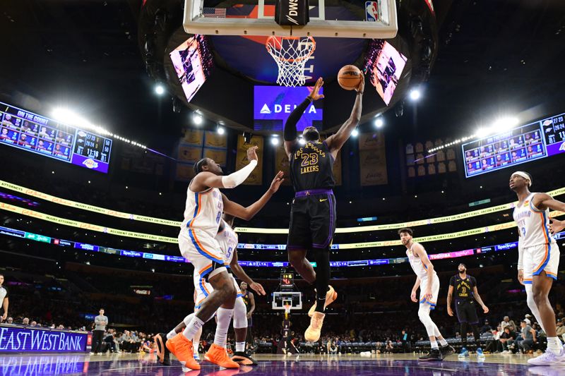 LOS ANGELES, CA - JANUARY 15: LeBron James #23 of the Los Angeles Lakers drives to the basket during the game against the Oklahoma City Thunder on January 15, 2024 at Crypto.Com Arena in Los Angeles, California. NOTE TO USER: User expressly acknowledges and agrees that, by downloading and/or using this Photograph, user is consenting to the terms and conditions of the Getty Images License Agreement. Mandatory Copyright Notice: Copyright 2024 NBAE (Photo by Adam Pantozzi/NBAE via Getty Images)