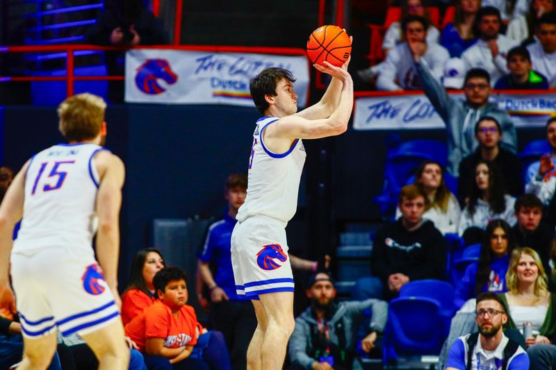 Feb 20, 2024; Boise, Idaho, USA;  Boise State Broncos guard RJ Keene (5) shoots a three-point shot during the first half against the San Jose State Spartans at ExtraMile Arena. Mandatory Credit: Brian Losness-USA TODAY Sports