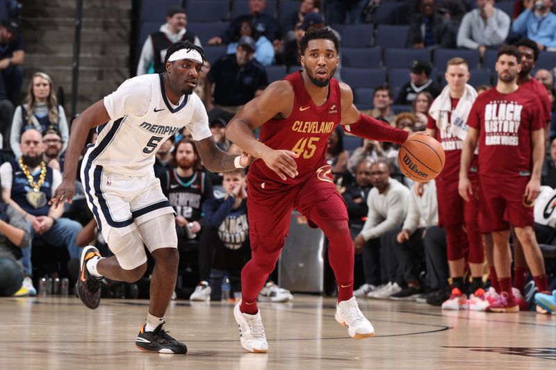 MEMPHIS, TN - FEBRUARY 1:  Donovan Mitchell #45 of the Cleveland Cavaliers handles the ball during the game  against the Memphis Grizzlies on February 1, 2024 at FedExForum in Memphis, Tennessee. NOTE TO USER: User expressly acknowledges and agrees that, by downloading and or using this photograph, User is consenting to the terms and conditions of the Getty Images License Agreement. Mandatory Copyright Notice: Copyright 2024 NBAE (Photo by Joe Murphy/NBAE via Getty Images)