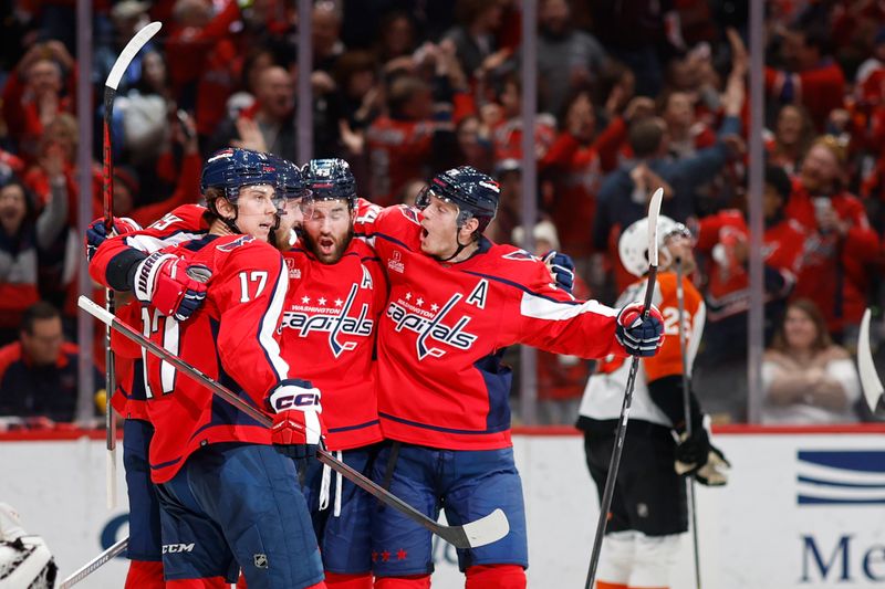 Mar 1, 2024; Washington, District of Columbia, USA; Washington Capitals right wing Anthony Mantha (39) celebrates with teammates after scoring a goal against the Philadelphia Flyers in the third period at Capital One Arena. Mandatory Credit: Geoff Burke-USA TODAY Sports