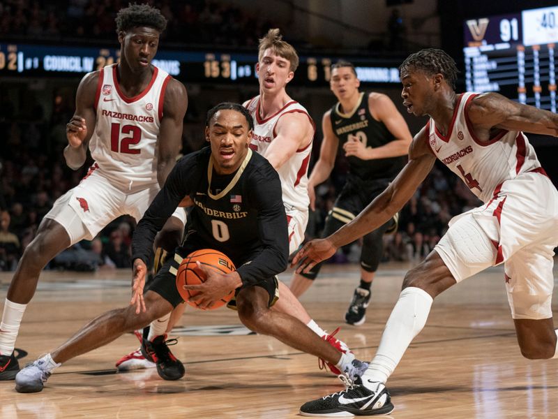 Jan 14, 2023; Nashville, Tennessee, USA;   
Vanderbilt Commodores guard Tyrin Lawrence (0) controls the ball against Arkansas Razorbacks guard Barry Dunning Jr. (12) and guard Davonte Davis (4) during the second half at Memorial Gymnasium. Mandatory Credit: George Walker IV - USA TODAY Sports