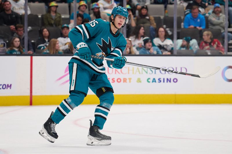 Jan 27, 2024; San Jose, California, USA; San Jose Sharks defenseman Shakir Mukhamadullin (85) skates against the Buffalo Sabres during the third period at SAP Center at San Jose. Mandatory Credit: Robert Edwards-USA TODAY Sports