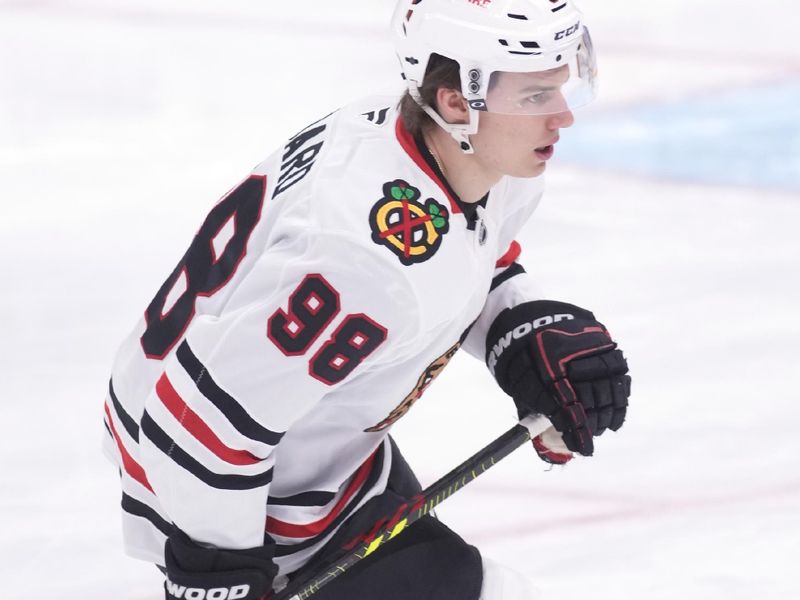 Dec 2, 2024; Toronto, Ontario, CAN; Chicago Blackhawks forward Connor Bedard (98) skates during warm up before a game against the Toronto Maple Leafs at Scotiabank Arena. Mandatory Credit: John E. Sokolowski-Imagn Images