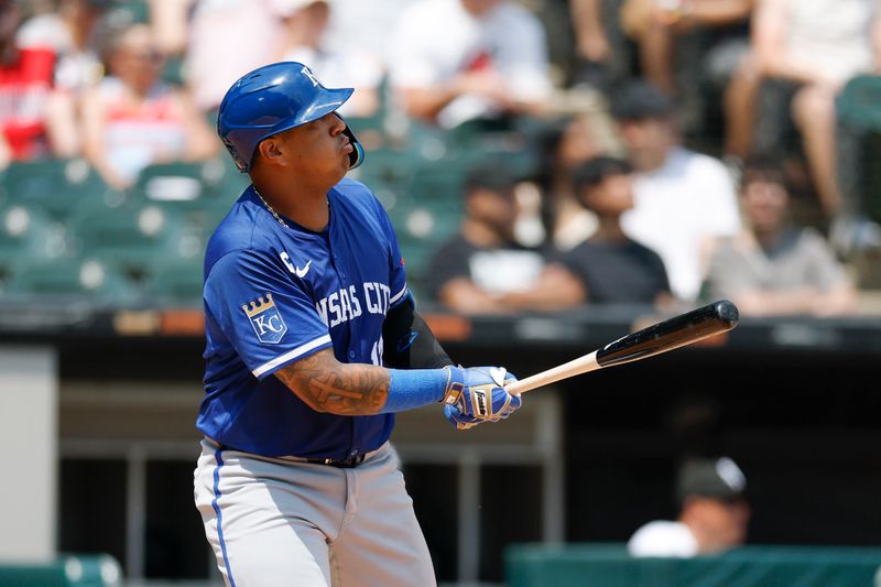 Jun 8, 2025; Chicago, Illinois, USA; Kansas City Royals catcher Salvador Perez (13) hits a two-run home run against the Chicago White Sox during the fourth inning at Rate Field. Mandatory Credit: Kamil Krzaczynski-Imagn Images