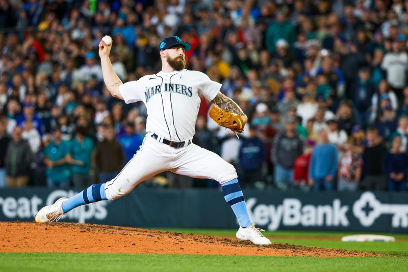 Jun 18, 2023; Seattle, Washington, USA; Seattle Mariners relief pitcher Ty Adcock (70) throws against the Chicago White Sox during the ninth inning at T-Mobile Park. Mandatory Credit: Joe Nicholson-USA TODAY Sports