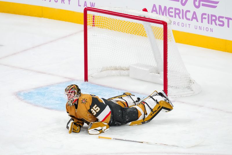 Nov 30, 2024; Las Vegas, Nevada, USA; Vegas Golden Knights goaltender Ilya Samsonov (35) reacts after surrendering a goal to Utah Hockey Club center Nick Schmaltz (8) during the second period at T-Mobile Arena. Mandatory Credit: Stephen R. Sylvanie-Imagn Images