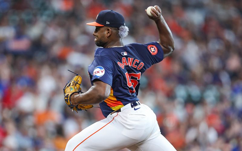 Jul 14, 2024; Houston, Texas, USA; Houston Astros starting pitcher Ronel Blanco (56) delivers a pitch during the first inning against the Texas Rangers at Minute Maid Park. Mandatory Credit: Troy Taormina-USA TODAY Sports