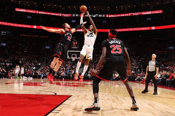 TORONTO, CANADA - DECEMBER 23:  Jordan Clarkson #00 of the Utah Jazz shoots the ball during the game against the Toronto Raptors on December 23, 2023 at the Scotiabank Arena in Toronto, Ontario, Canada.  NOTE TO USER: User expressly acknowledges and agrees that, by downloading and or using this Photograph, user is consenting to the terms and conditions of the Getty Images License Agreement.  Mandatory Copyright Notice: Copyright 2023 NBAE (Photo by Vaughn Ridley/NBAE via Getty Images)