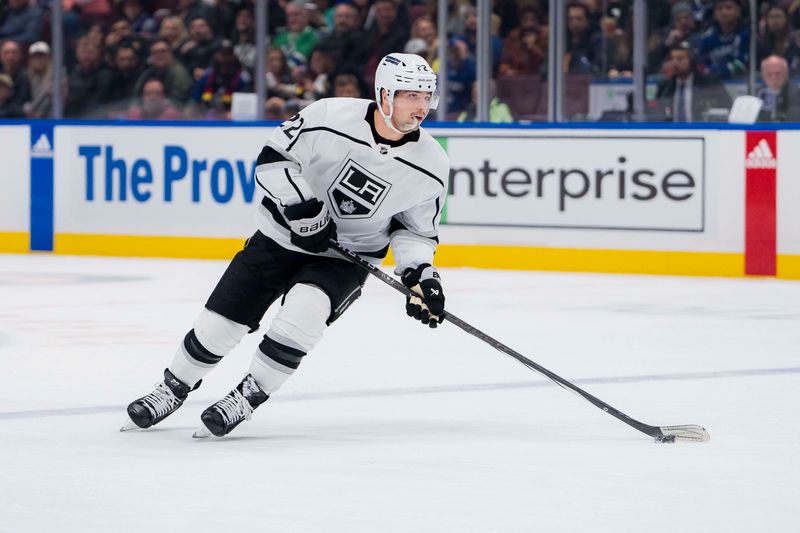 Feb 29, 2024; Vancouver, British Columbia, CAN; Los Angeles Kings forward Kevin Fiala (22) handles the puck against the Vancouver Canucks in the second period at Rogers Arena. Mandatory Credit: Bob Frid-USA TODAY Sports