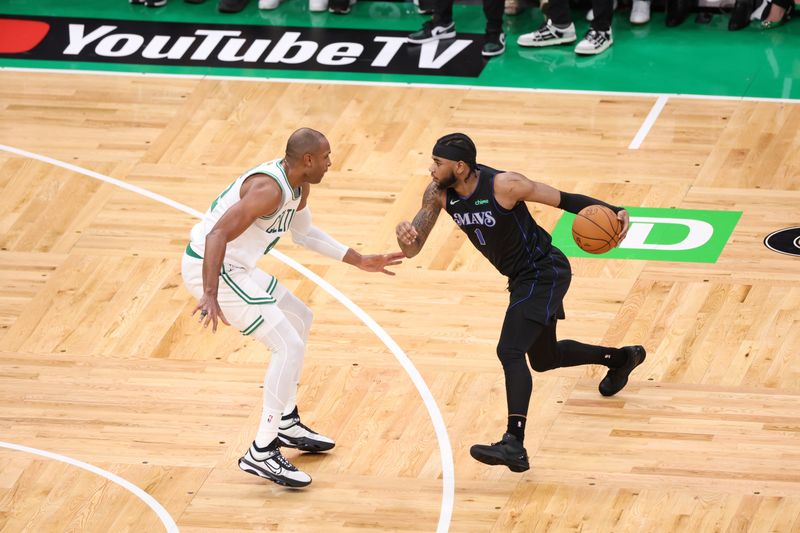 BOSTON, MA - JUNE 6: Jaden Hardy #1 of the Dallas Mavericks dribbles the ball during the game against the Boston Celtics during Game 1 of the 2024 NBA Finals on June 6, 2024 at the TD Garden in Boston, Massachusetts. NOTE TO USER: User expressly acknowledges and agrees that, by downloading and or using this photograph, User is consenting to the terms and conditions of the Getty Images License Agreement. Mandatory Copyright Notice: Copyright 2024 NBAE  (Photo by Joe Murphy/NBAE via Getty Images)
