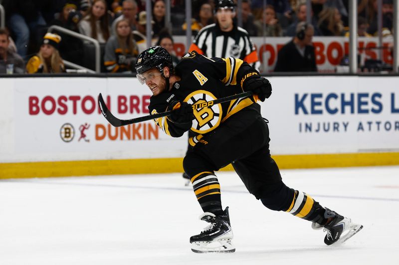 Oct 11, 2025; Boston, Massachusetts, USA; Boston Bruins right wing David Pastrnak (88) lets go with a shot against the Buffalo Sabres during the first period at TD Garden. Mandatory Credit: Winslow Townson-Imagn Images
