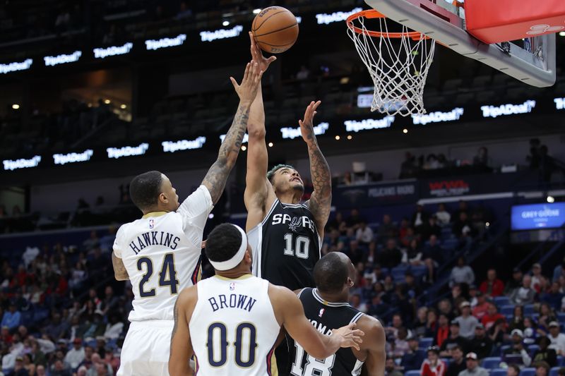 NEW ORLEANS, LOUISIANA - FEBRUARY 25: Jeremy Sochan #10 of the San Antonio Spurs shoots against Jordan Hawkins #24 of the New Orleans Pelicans during the second half at Smoothie King Center on February 25, 2025 in New Orleans, Louisiana. NOTE TO USER: User expressly acknowledges and agrees that, by downloading and or using this Photograph, user is consenting to the terms and conditions of the Getty Images License Agreement. (Photo by Jonathan Bachman/Getty Images)