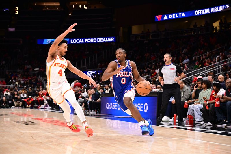 ATLANTA, GA - OCTOBER 14:  Tyrese Maxey #0 of the Philadelphia 76ers drives to the basket during the game against the Atlanta Hawks during a preseason game on October 14, 2024 at State Farm Arena in Atlanta, Georgia.  NOTE TO USER: User expressly acknowledges and agrees that, by downloading and/or using this Photograph, user is consenting to the terms and conditions of the Getty Images License Agreement. Mandatory Copyright Notice: Copyright 2024 NBAE (Photo by Adam Hagy/NBAE via Getty Images)