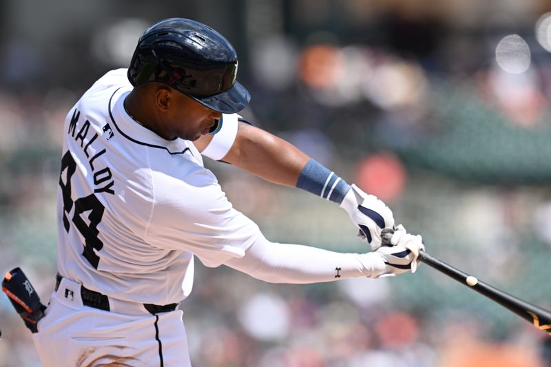 Jun 13, 2024; Detroit, Michigan, USA;  Detroit Tigers designated hitter Justyn-Henry Malloy (44) hits a two-RBI double against the Washington Nationals in the seventh inning at Comerica Park. Mandatory Credit: Lon Horwedel-USA TODAY Sports