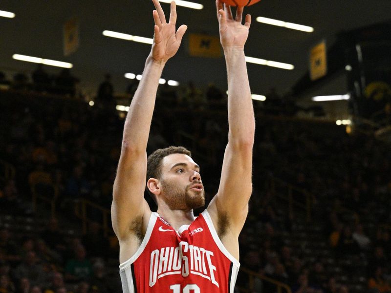 Feb 2, 2024; Iowa City, Iowa, USA; Ohio State Buckeyes forward Jamison Battle (10) shoots the ball against the Iowa Hawkeyes during the first half at Carver-Hawkeye Arena. Mandatory Credit: Jeffrey Becker-USA TODAY Sports