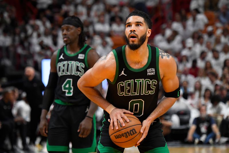 MIAMI, FL - APRIL 27: Jayson Tatum #0 of the Boston Celtics shoots a free throw during the game against the Miami Heat during Round 1 Game 3 of the 2024 NBA Playoffs on April 27, 2024 at Kaseya Center in Miami, Florida. NOTE TO USER: User expressly acknowledges and agrees that, by downloading and or using this Photograph, user is consenting to the terms and conditions of the Getty Images License Agreement. Mandatory Copyright Notice: Copyright 2024 NBAE (Photo by Brian Babineau/NBAE via Getty Images)